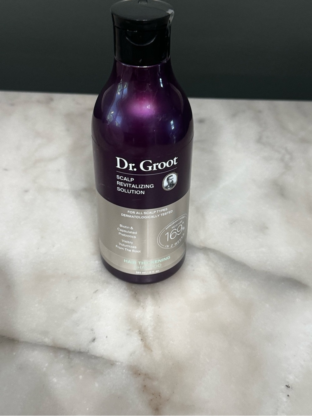 Purple Scalp Revitalizing Shampoo Bottle